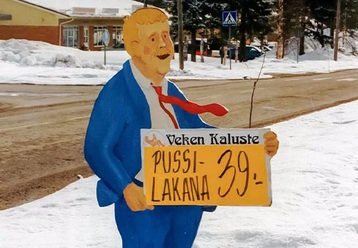 Veken Kalusteen mainoskyltti 1996